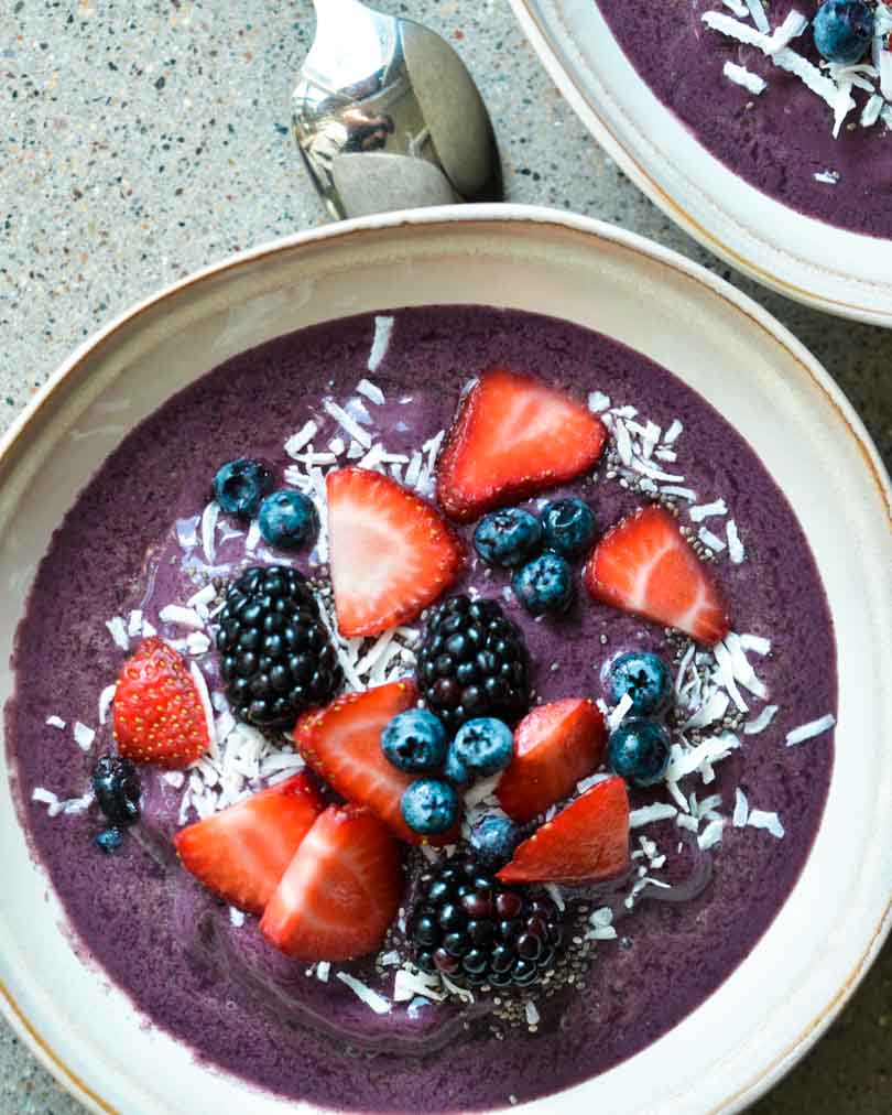 acai bowl piled with toppings