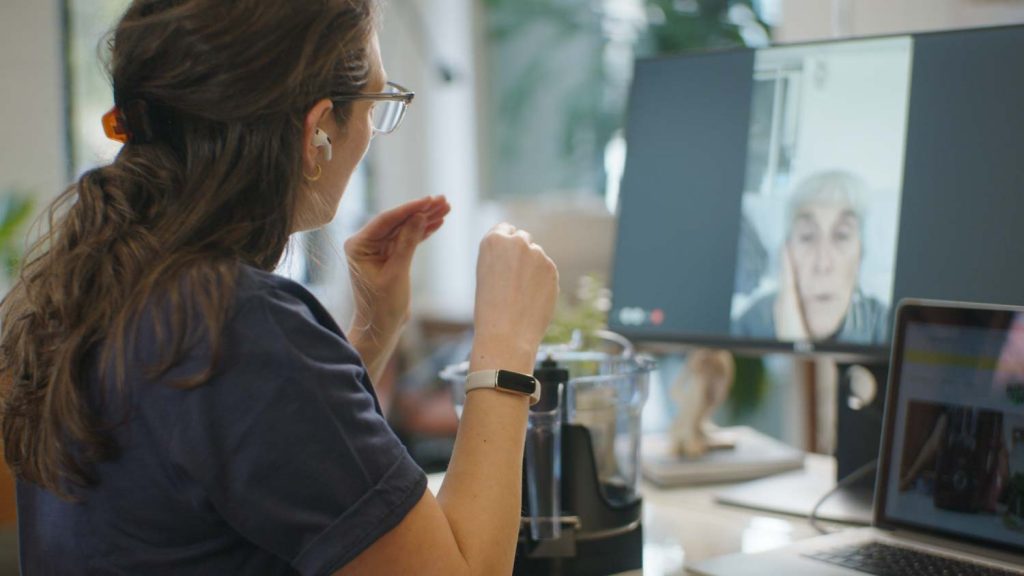Shalva Gale supporting a Blending For Good customer on a video call.